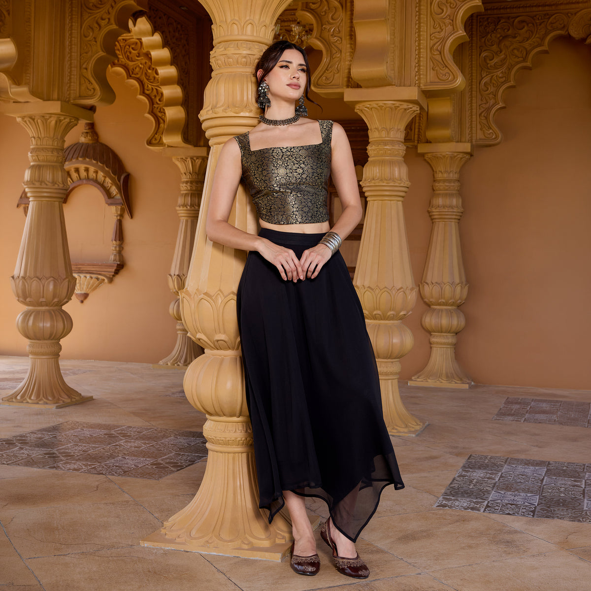 Sleeveless Brocade top with Asymetrical Skirt