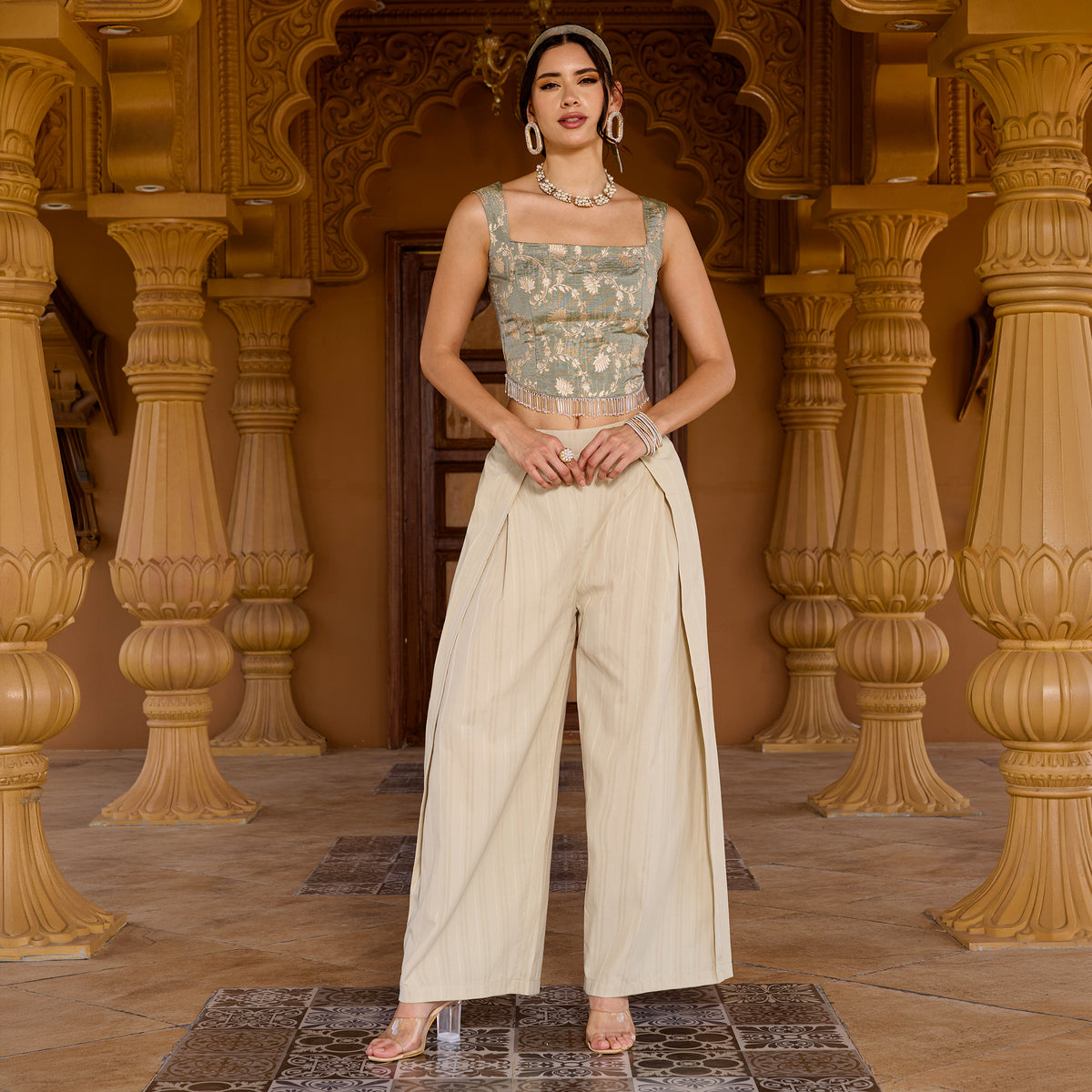 Sleeveless brocade top with trousers
