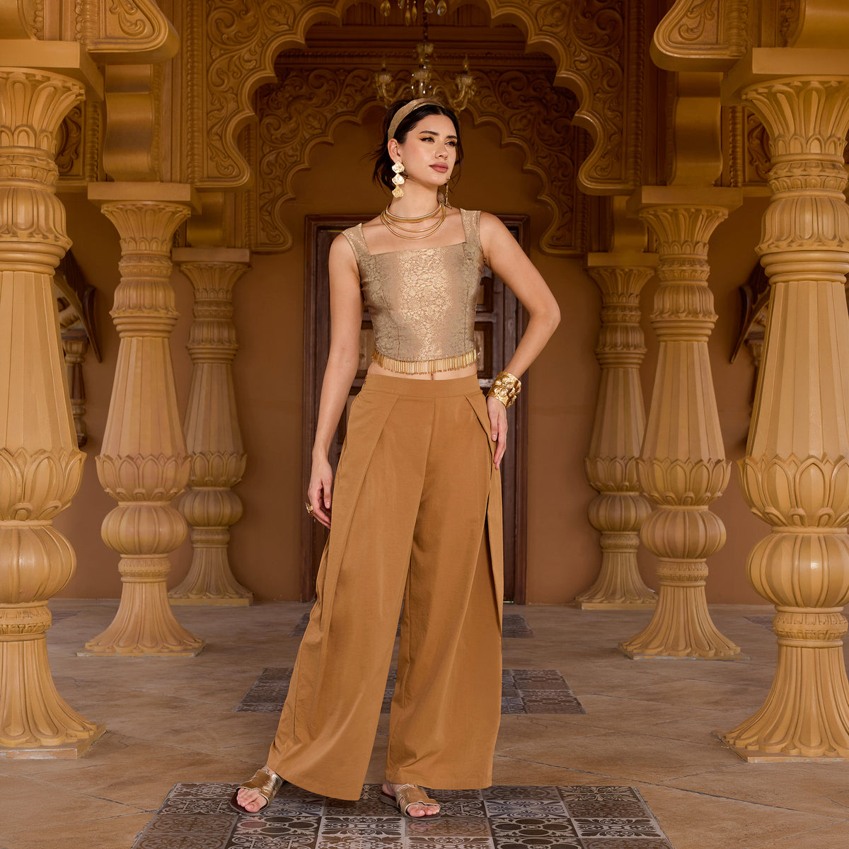 Sleeveless brocade top with trousers