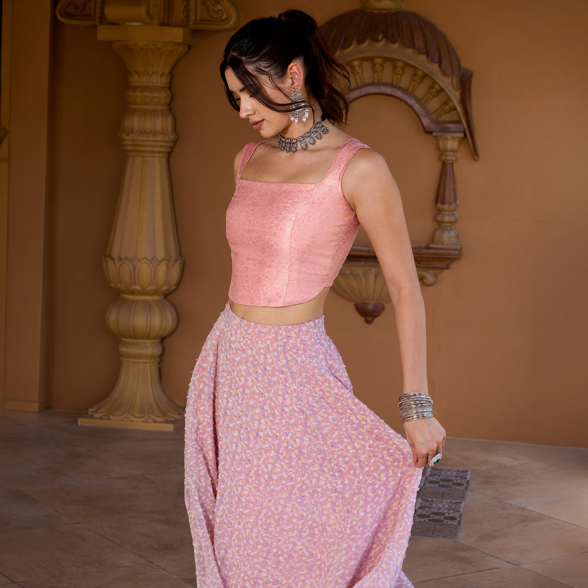 Sleeveless Brocade top with Asymetrical Skirt