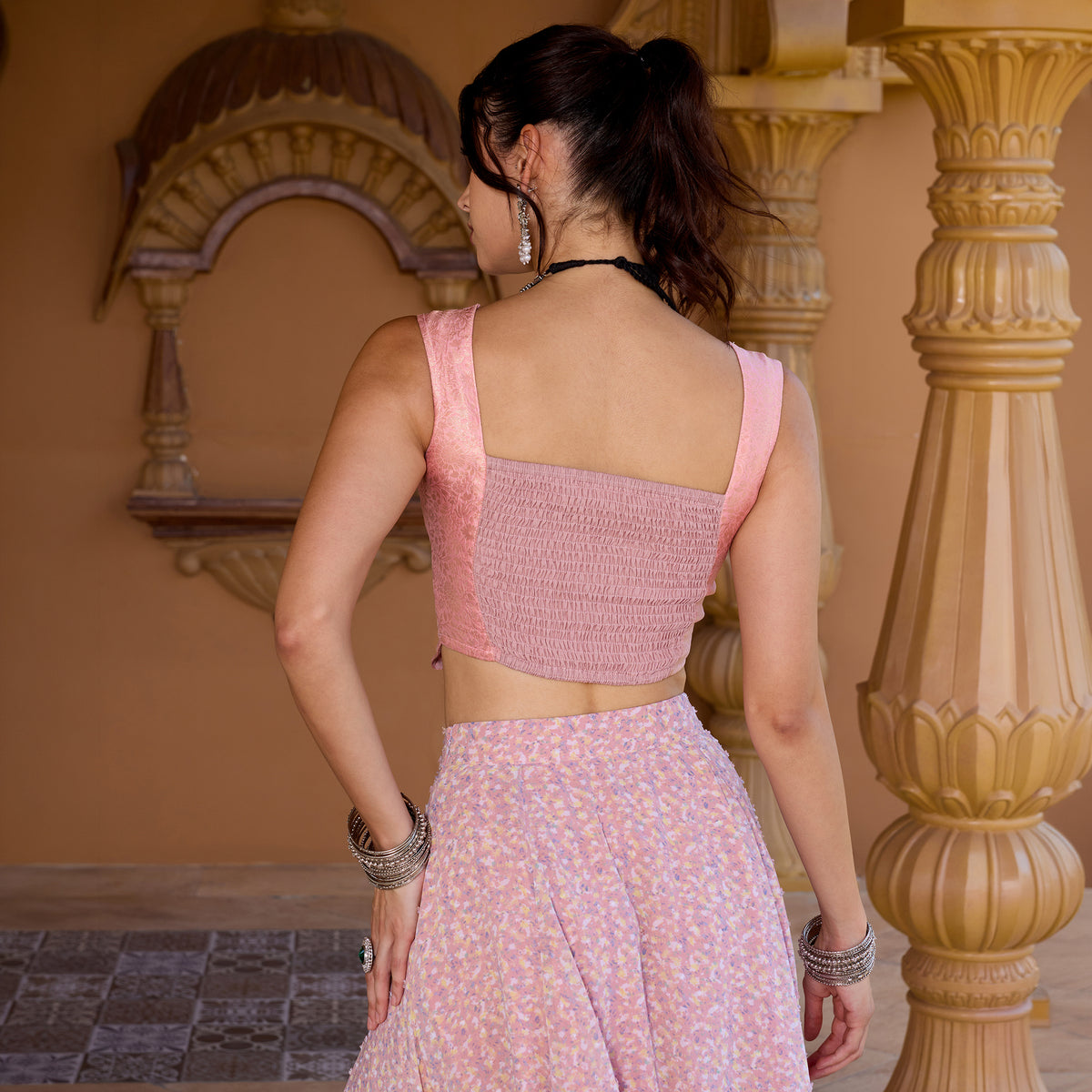 Sleeveless Brocade top with Asymetrical Skirt
