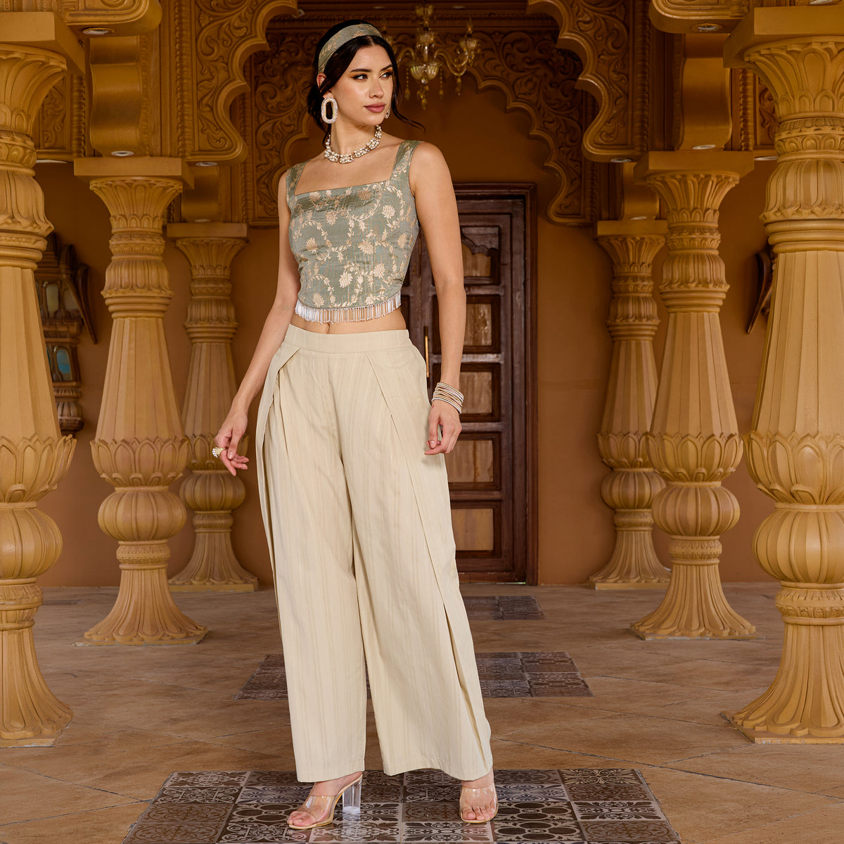 Sleeveless brocade top with trousers