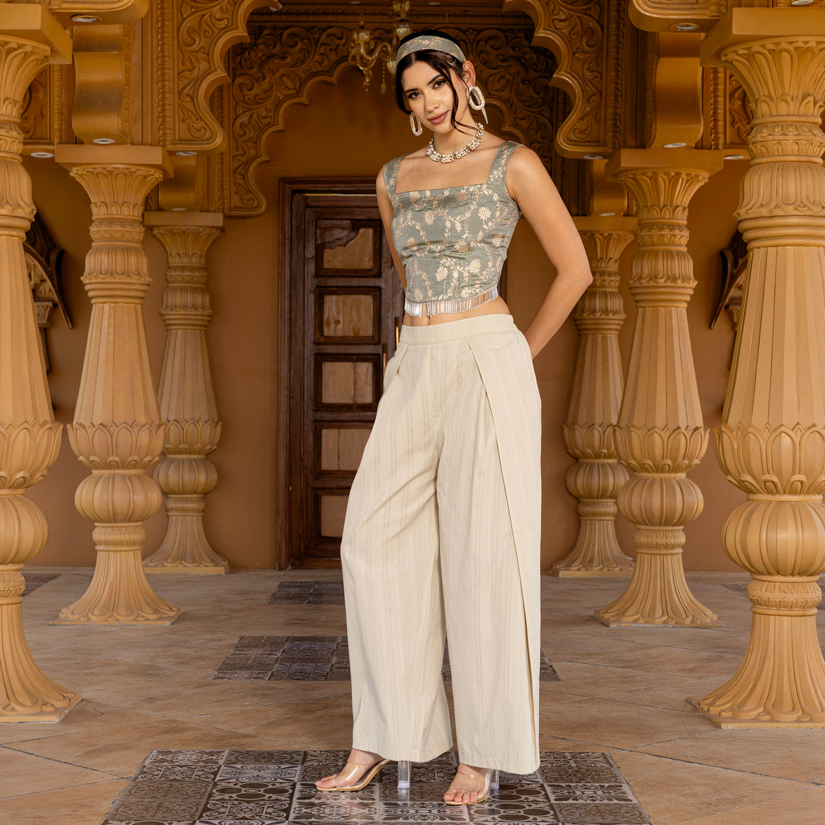 Sleeveless brocade top with trousers