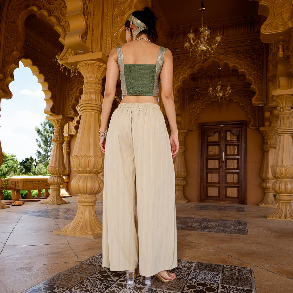 Sleeveless brocade top with trousers