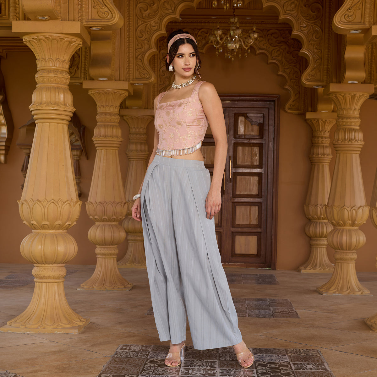 Sleeveless brocade top with trousers